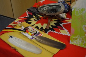 Indigenous women Elders The Eagle Feathers and Smudge along with tobacco at City Hall - Image taken with permission