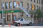 tbaytel crew working on Eye in the Sky camera at May and Victoria corner