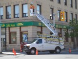 tbaytel crew working on Eye in the Sky camera at May and Victoria corner