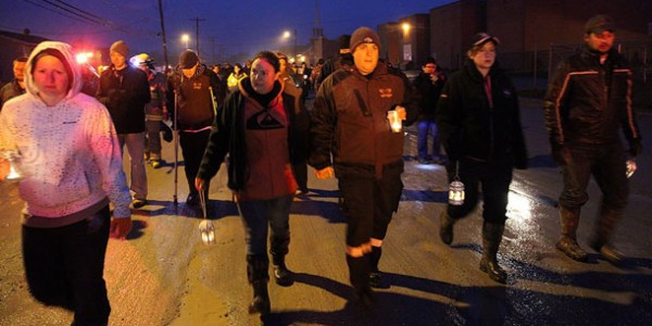 Somber walk to honour the Air Crew - Photo by Chris Kat