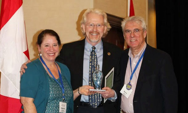 Dr. Scott Sellick receives the Canadian Association of Psychosocial Oncology (CAPO) 2013 Life Time Achievement Award in Ottawa at the annual CAPO conference from esteemed colleagues Dr. Deborah Lynn McLeod, Clinician Scientist at QEII Health Sciences Centre and Assistant Professor, Dalhousie University, and Dr. Barry Bultz, Director of Psychosocial Oncology at Alberta’s Tom Baker Cancer Centre and Professor and Head of Psychosocial Oncology at University of Calgary’s Faculty of Medicine. The award is presented to a leader who has made an exceptional and enduring contribution in the field of Canadian psychosocial oncology.
