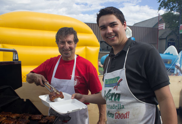 St. Anthony Holy Name Society - Barbecue - Here Peter Pullia serves up some fall of the bone ribs.