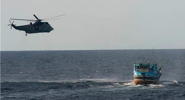 The Sea King Helicopter crew of Her Majesty's Canadian Ship Toronto stops a suspected smuggling dhow in the Arabian Sea region on October 05, 2013. HMCS Toronto is currently deployed on Operation Artemis, the Canadian Armed Forces participation in maritime security and counter-terrorism operations in the Arabian Sea. HMCS Toronto's task is to detect, deter and protect against terrorist activity by patrolling and conducting maritime security operations in her area of responsibility.  The Halifax-class frigate has a CH-124 Sea King helicopter air detachment as well as a shipboard unmanned aerial vehicle detachment. Photo Credit: Leading Seaman Dan Bard, Formation Imaging Services, Halifax, Nova Scotia