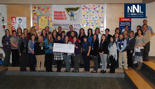 Woodcrest P.S. teachers came together to make a $1,000 donation in support of one of their colleagues who is currently undergoing cancer treatment. 