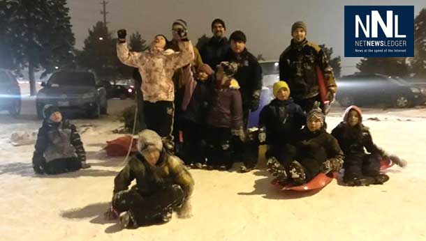 Members of the Community Action Group from Windsor Neighbourhood enjoy sliding at Balsam - Photo by Alaina King