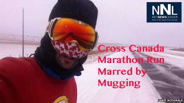 Jamie Mcdonald's cross country marathon has been marred by a mugging in Banff Alberta