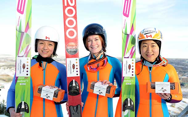 Canadian women's ski jumping team members Alexandra Pretorius, Taylor Henrich and Atsuko Tanaka