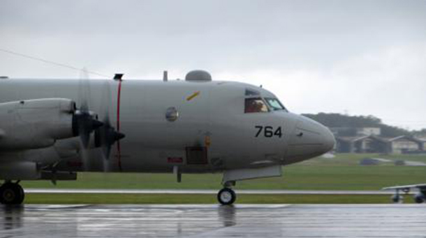 A P-3C Orion aircraft departs from Kadena Air Base in Okinawa, Japan, to aid in the search efforts of the missing Malaysia Airlines flight MH370. The P-3C brings long-range search, radar and communications capabilities to the efforts. The flight had 227 passengers from 14 nations, mainly China, and 12 crew members. According to the Malaysia Airlines website, three Americans, including one infant, were also aboard. (U.S. Navy photo)