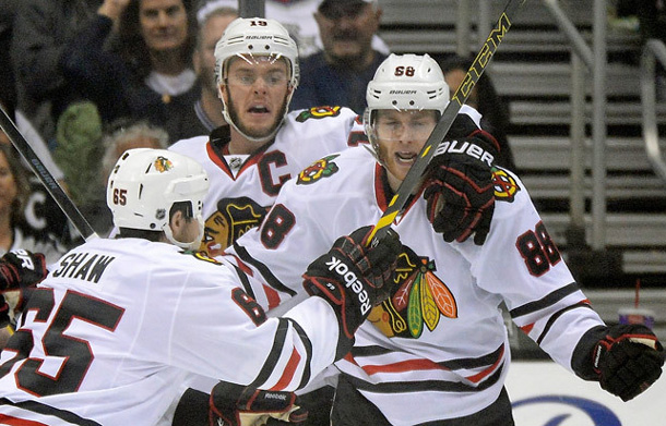 The Chicago Blackhawks celebrate after a win in Game Six