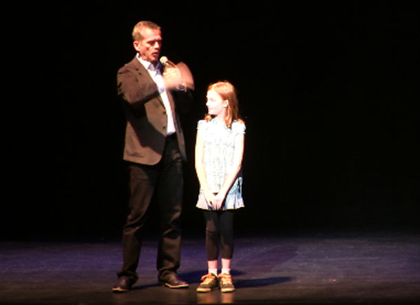 Col. Chris Hadfield engages with Aurora on how gravity impacts the body at a Leadership Thunder Bay event for youth.
