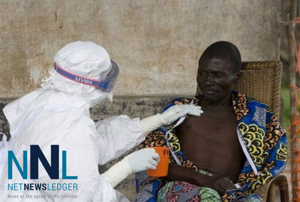 A nurse comforts a patient who has been diagnosed to have the Ebola virus. Photo: WHO/Chris Black