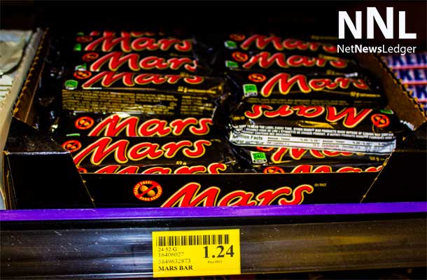 That tasty Mars Bar is going to climb in price by at least a dime.