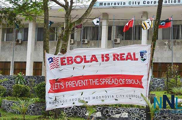 A sign outside the Monrovia City Corporation in Liberia aims at preventing the spread of Ebola. Photo: UNMIL