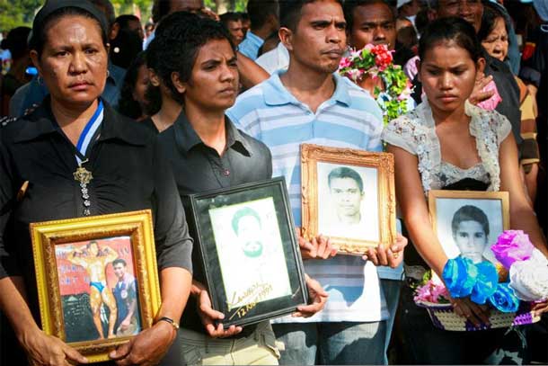 Thousands commemorate the 17th anniversary of the Santa Cruz massacre. Many carried photographs of loved ones who died or who disappeared on 12 November 1991 when the Indonesian military opened fire on a group of pro-independence supporters during a peaceful demonstration.