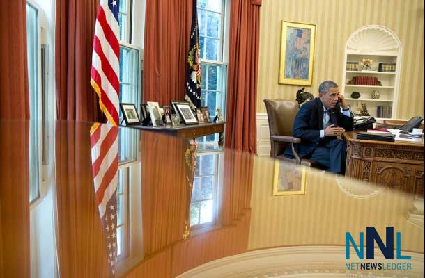 President Barack Obama talks on the phone with British Prime Minister David Cameron in the Oval Office, Saturday, Aug. 9, 2014. (Official White House Photo by Pete Souza)