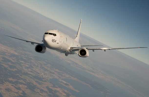 A U.S. Navy P-8 Poseidon in flight. According to the Defense Department, a U.S. aircraft of the same type on a routine mission flying in the Pacific Ocean region was "buzzed" Aug. 19 by a Chinese fighter jet about 135 miles east of Hainan Island in international airspace. U.S. Navy photo 