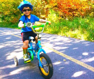 Michael Vita loves riding his bike, rainboots and all. He says "Thank You!" to those who have made a gift through the Health Sciences Foundation to ensure the Health Sciences Centre has the equipment needed to heal those who are hurt or sick.
