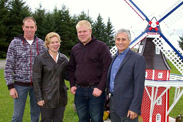 Minister Bill Mauro with Gert & Peggy Brekveld, owners of Woodstar Farm, and their son Andrew.