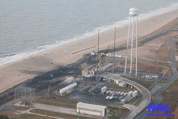 An aerial view of the Wallops Island launch facilities taken by the Wallops Incident Response Team Oct. 29 following the failed launch attempt of Orbital Science Corp.'s Antares rocket Oct. 28. Image Credit: NASA/Terry Zaperach