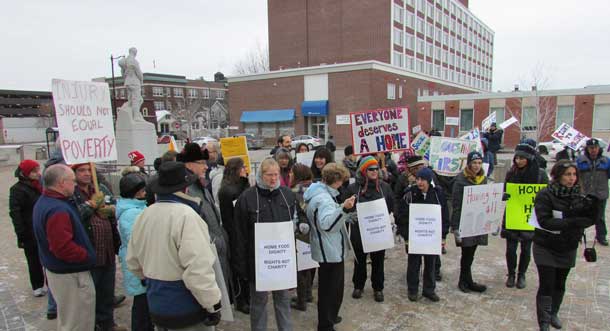 A large crowd gathered at Thunder Bay City Hall braving the chill to send the message