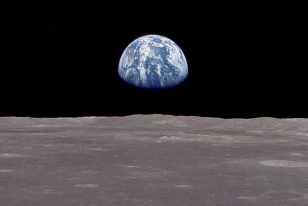 Earth rise as seen from Apollo 8 the first time man orbited the Moon.