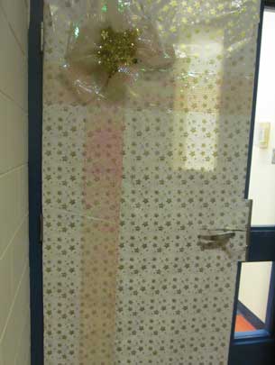 Wonder who will get to unwrap the present of this classroom door?
