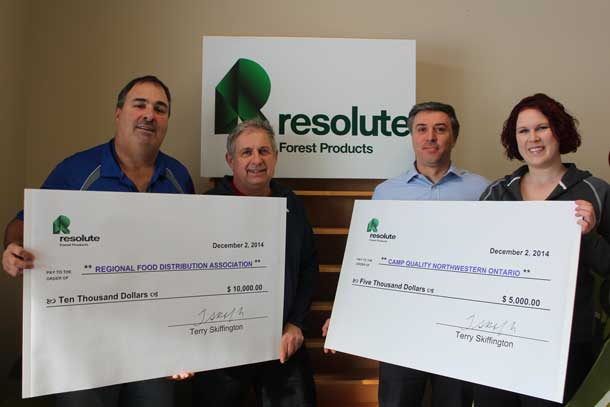 Resolute Forest Products JHSC Co-Chairs Alex Cryderman (left) and Tony Ruberto (second from right) present their contributions to Volker Kromm, Executive Director of the RFDA (second from left), and Ashleigh Quarrell Director of Camp Quality.
