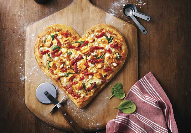 Some serious cheese and smiles at Boston Pizza with Valentine's Day Charity raising