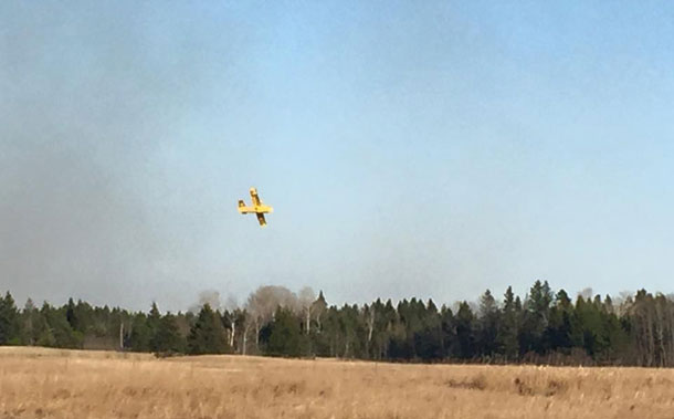 MNRF Water bomber fighting fire near Stanley - Image Tannis Smith