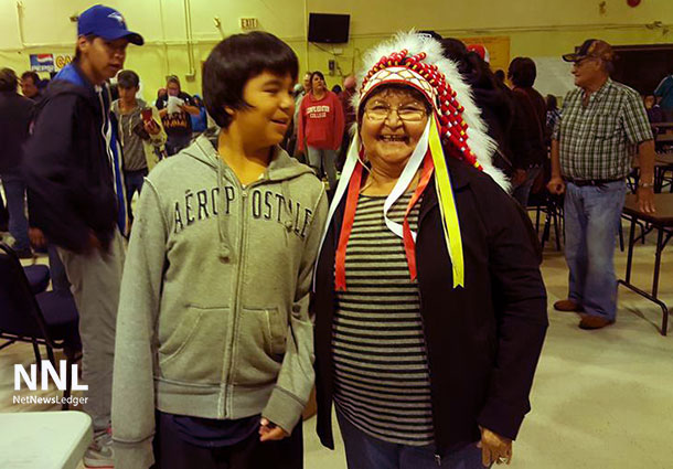 Ginoogaming First Nation Chief Echum with a young supporter