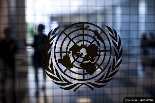 A United Nations logo is seen on a glass door in the Assembly Building at the United Nations headquarters in New York City September 18, 2015. As leaders from almost 200 nations gather for the annual general assembly at the United Nations, the world body created 70 years ago, Reuters photographer Mike Segar documented quieter moments at the famed 18-acre headquarters on Manhattan's East Side. The U.N., established as the successor to the failed League of Nations after World War Two to prevent a similar conflict from occurring again, attracts more than a million visitors every year to its iconic New York site. The marathon of speeches and meetings this year will address issues from the migrant crisis in Europe to climate change and the fight against terrorism. REUTERS/Mike SegarPICTURE 13 OF 30 FOR WIDER IMAGE STORY "INSIDE THE UNITED NATIONS HEADQUARTERS"SEARCH "INSIDE UN" FOR ALL IMAGES - RTX1SAQ1