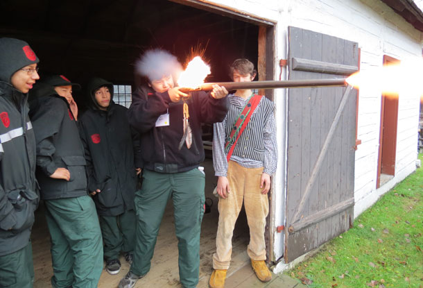Junior Canadian Rangers learn to fire muskets at Fort William Historical Park