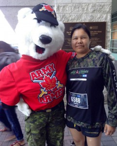 Pam meeting Canadian Army Mascot before the race.