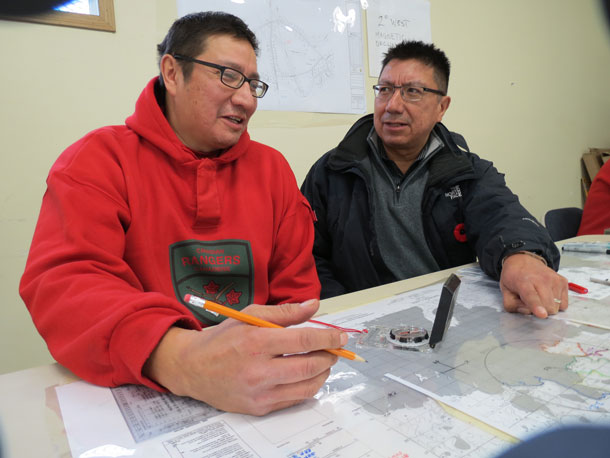 Ranger Jeff Fiddler gives a briefing on a search and rescue exercise in Sachigo Lake to his brother, Nishnawbe Aski Nation Grand Chief Alvin Fiddler