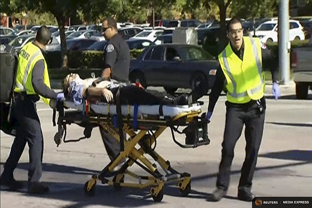 Rescue crews tend to the injured in the intersection outside the Inland Regional Center in San Bernardino, California in this still image taken from video December 2, 2015. REUTERS/NBCLA.com/Handout via Reuters