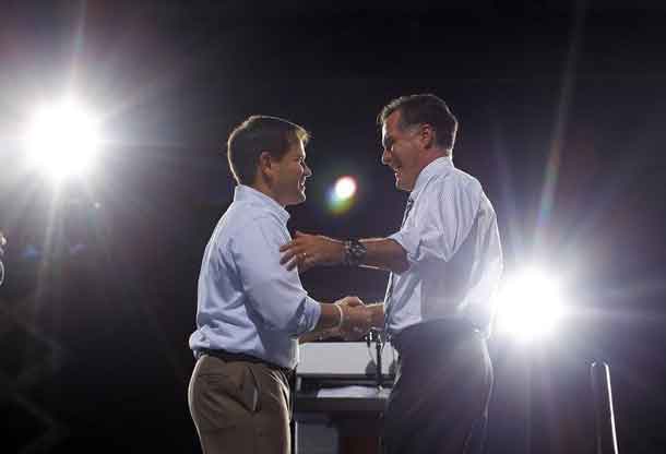 File photo of Mitt Romney (R) shaking hands with Marco Rubio (L) at a campaign rally in Coral Gables, Florida October 31, 2012. REUTERS/Brian Snyder