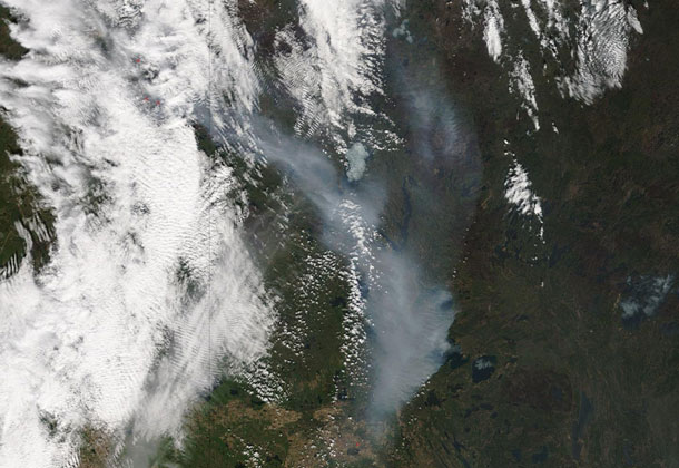 On May 8, 2016, the MODIS instrument on the Terra satellite captured this image of Ft. McMurray Fire in Alberta, Canada.  Credits: NASA Goddard MODIS Rapid Response Team