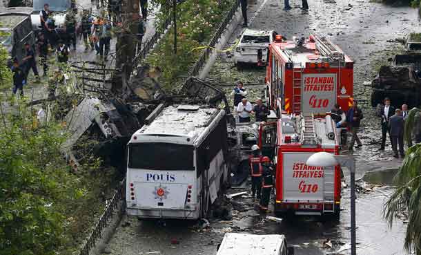 Fire engines stand beside a Turkish police bus which was targeted in a bomb attack in a central Istanbul district, Turkey, June 7, 2016.    REUTERS/Osman Orsal