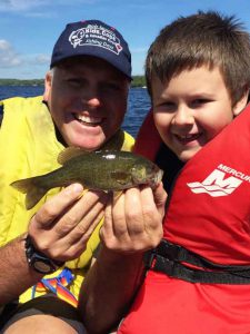 Ali fishing with the Thunder Bay Police Service