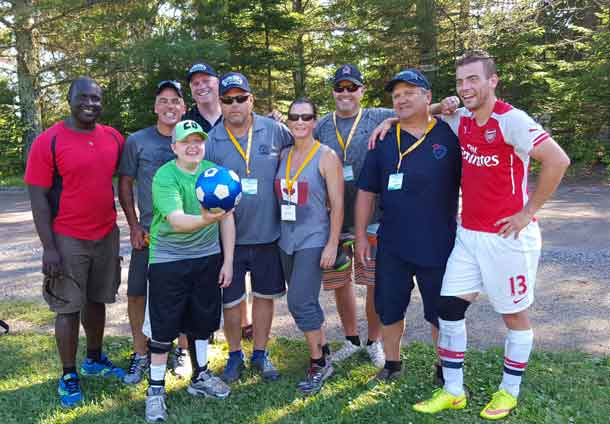 Camp Quality goalie Lyndon with the Thunder Bay Police Service Soccer team