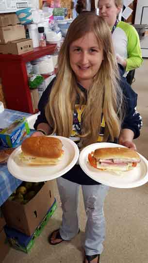 Taylor showing off her Olympic sized sandwiches
