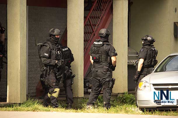Members of the TBPS Tactical Unit after coming down from the second floor of the building in the 700 Block of Simpson Street