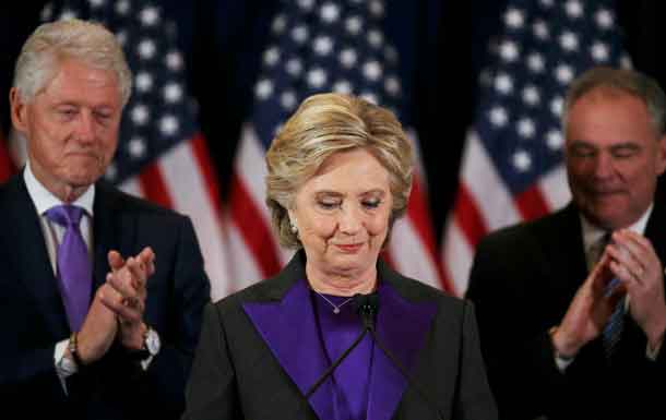 Hillary Clinton, accompanied by her husband former U.S. President Bill Clinton (L) and running mate Senator Tim Kaine, addresses her staff and supporters about the results of the U.S. election at a hotel in New York, November 9, 2016.  REUTERS/Carlos Barria