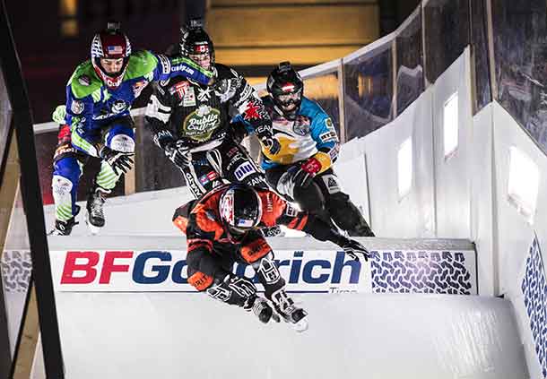 Cameron Naasz of the United States, Maxwell Dunne of the United States, Scott Croxall of Canada and Marco Dallago of Austria compete during the finals at the first stage of the ATSX Ice Cross Downhill World Championship at the Red Bull Crashed Ice in Marseille, France on January 14, 2017