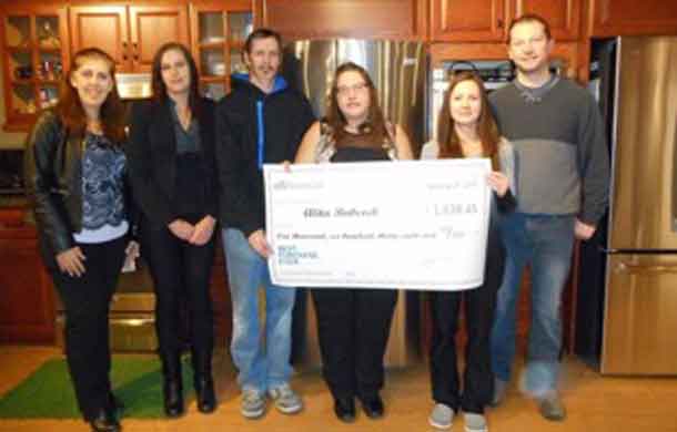Image (from left to right): CitiFinancial District Manager Karen Snider, CitiFinancial Branch Manager Jeanette Cassan, winner’s husband Shannon Babcock, winner Alita Babcock, Gould’s Sales Associate Rachelle Laramee and Gould’s Store Owner Jamie Gould.