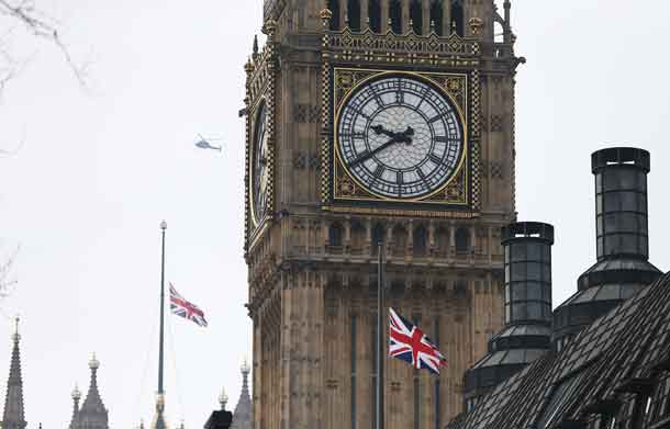 Flags fly at half-mast over the Houses of Parliament. REUTERS/Neil Hall