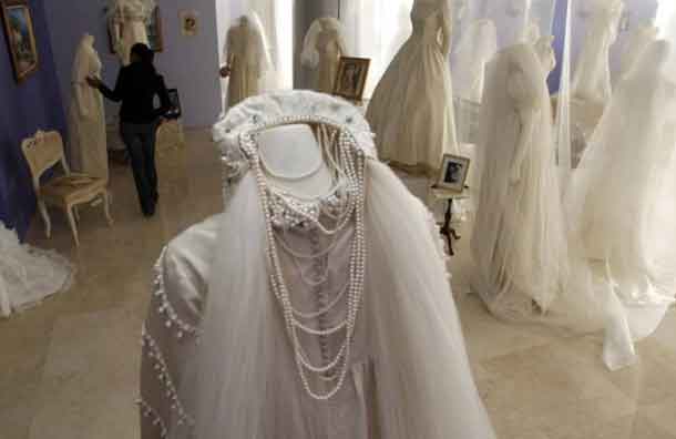 A visitor looks at wedding dresses during an exhibition at the Cultural center building in Ciudad Juarez in this 2012 archive photo. REUTERS/Jose Luis Gonzalez