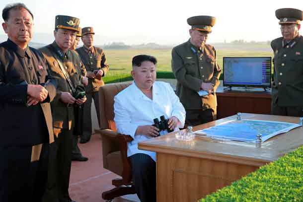 North Korean leader Kim Jong Un watches the test of a new-type anti-aircraft guided weapon system organised by the Academy of National Defence Science in this undated photo released by North Korea's Korean Central News Agency (KCNA) May 28, 2017. KCNA/via REUTERS