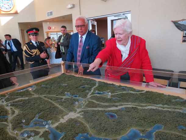Greenstone Mayor Renald Beaulieu and Ontario Lieutenant-Governor Elizabeth Dowdeswell look at a relief model of the region at the Geraldton Interpretive Centre.