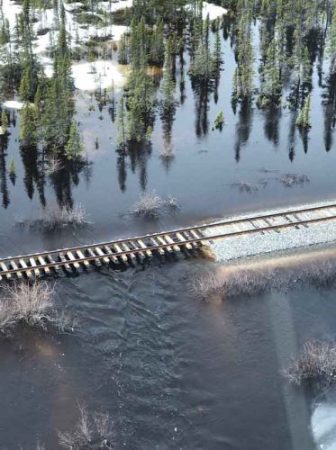 Image of damage caused by flooding to the OMNITRAX rail line - Supplied by OM ITRAX